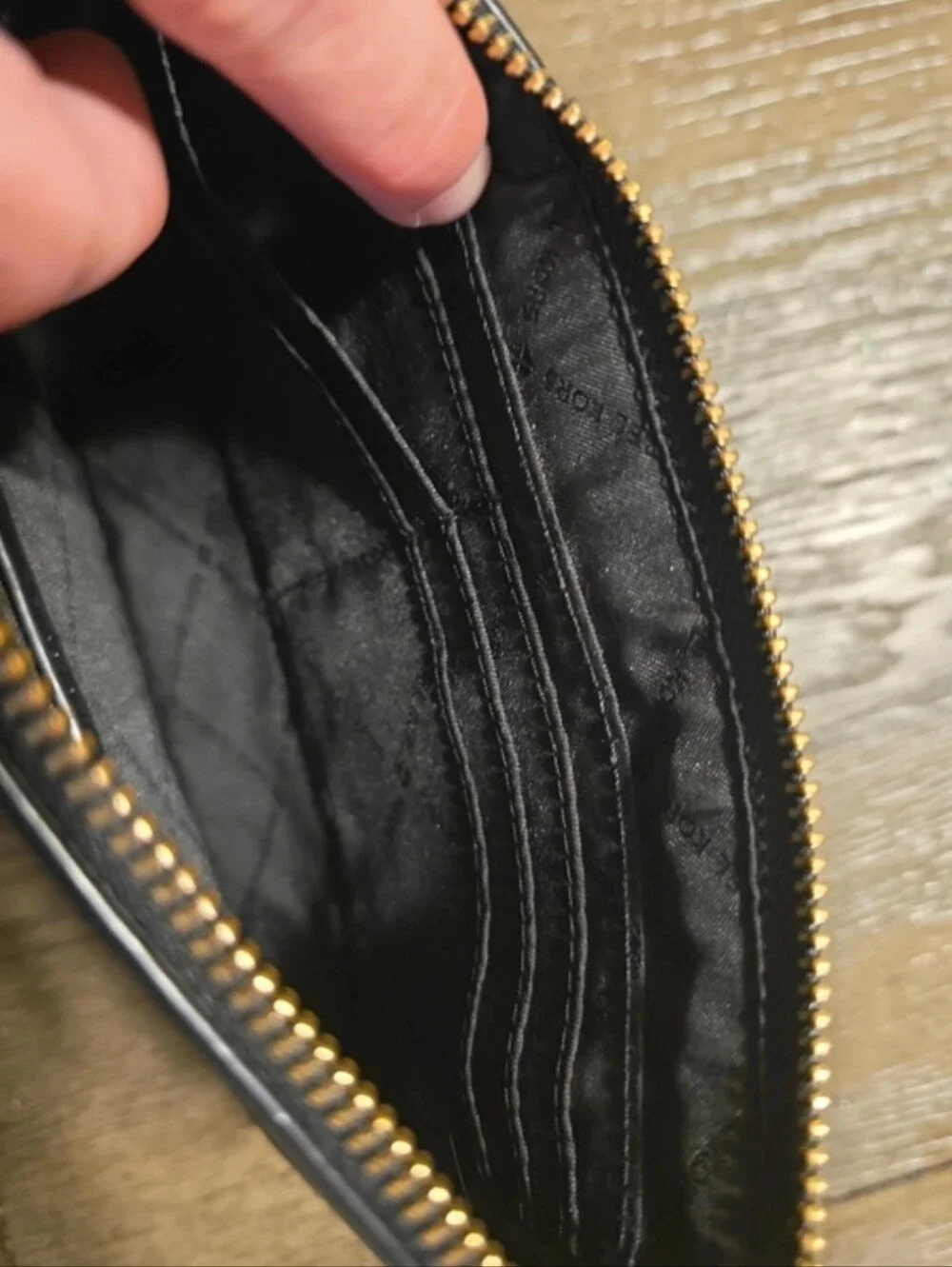 Michael Kors Black Wristlet Clutch with Gold Logo